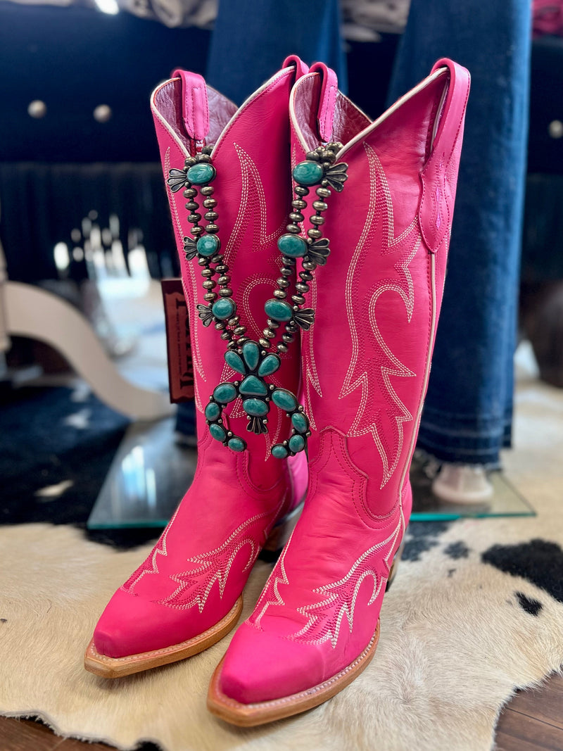 Ferrini Boot Company I Gussied Up Online. pink. cowgirl boots. Western cowgirl boots. hot pink. genuine leather. v toe. knee high. boots. sassy. western boot stitching. Small business. Western Women's Boutique. Ships fast from Texas. 