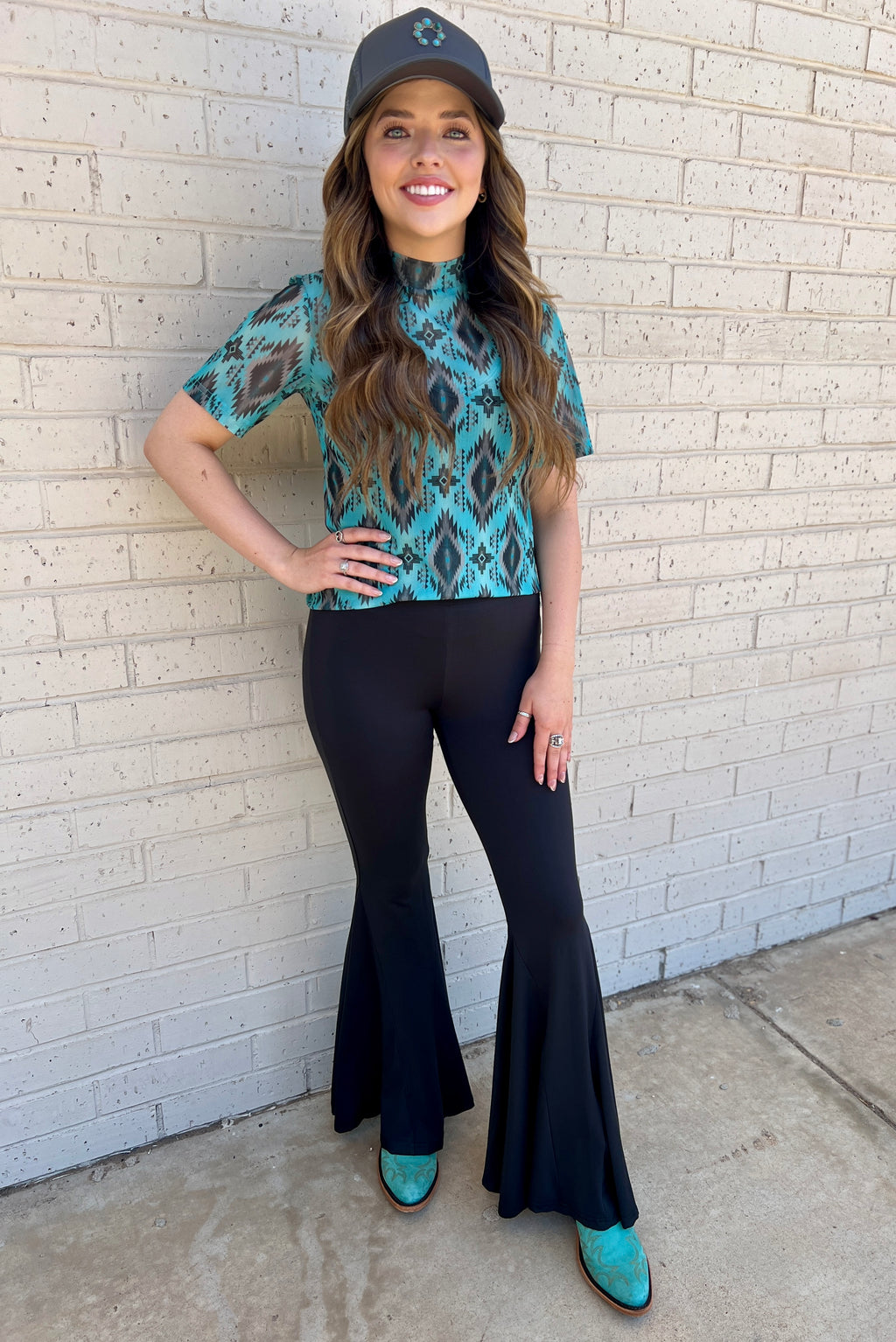 Sterling Kreek Bell Bottoms. Bell Bottoms. black pants. High waisted pants. black Bell bottoms. Stretchy pants. Comfortable pants. Western style. Women's western wear. Women's black pants. Women's western boutique. Women's western wear. Online boutique. Small business. Woman owned. 