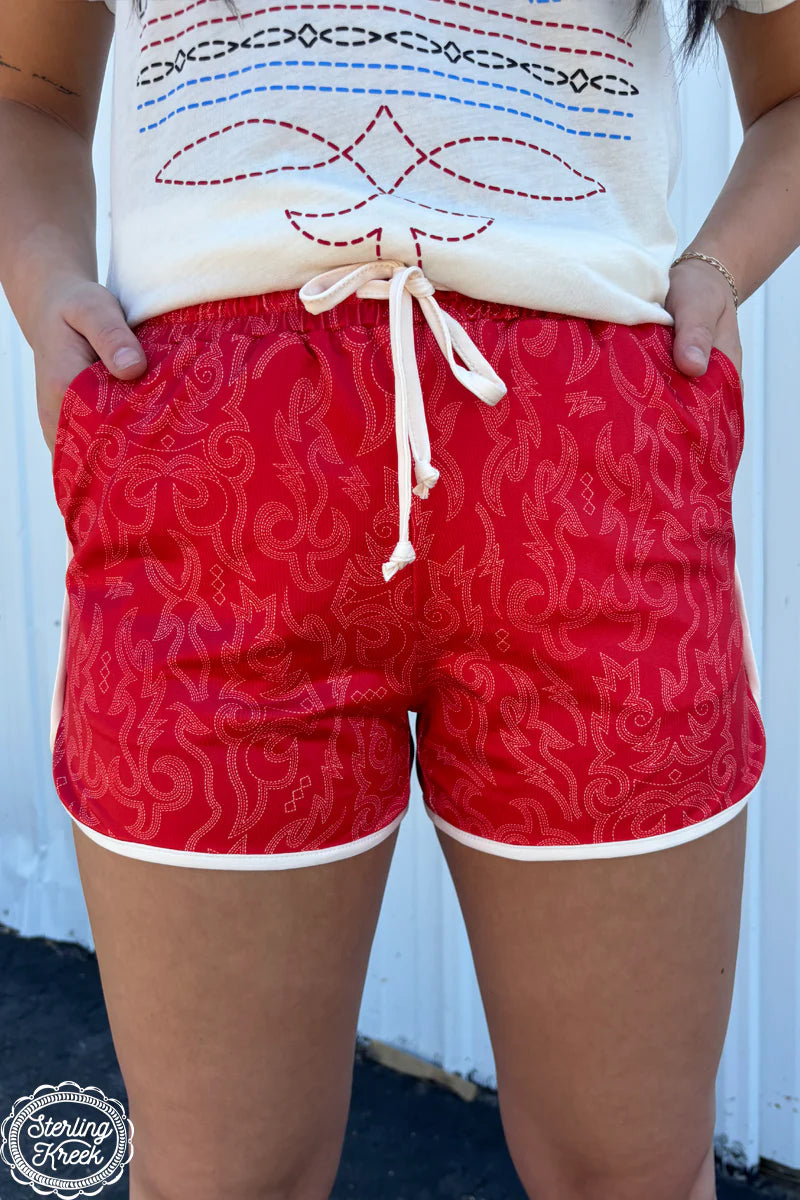 Sterling Kreek Raised Round Here Shorts I Gussieduponline. red. shorts. pockets. boot stitching design. drawstring. western boutique. small business. womens western boutique. gussied up online.