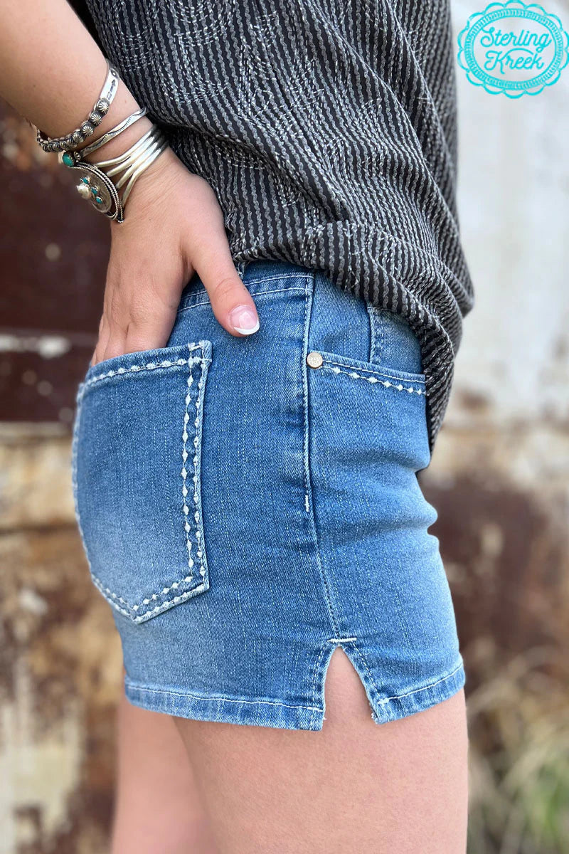 Sterling Kreek Stitched Denim Light Wash Shorts I Gussied Up Online. shorts. bottoms. denim. stitched. pockets. light wash denim. light wash. button up. bottoms. small business. Women's Western Boutique. Ships fast from Texas. 