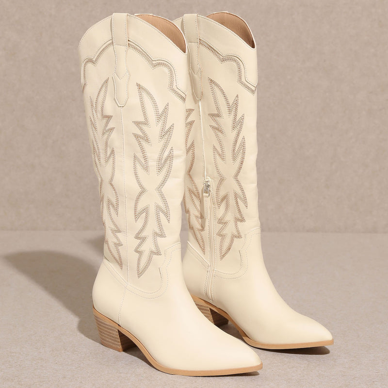 Miim Shoes I Gussieduponline. off white. boots. knee high boots. faux leather. zip up. cowgirl boots. whip stitch. western. western cowgirl boots. small business. Woman Owned Boutique. Ships fast from Texas. 